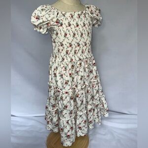 Polo RL white dress with floral detail.